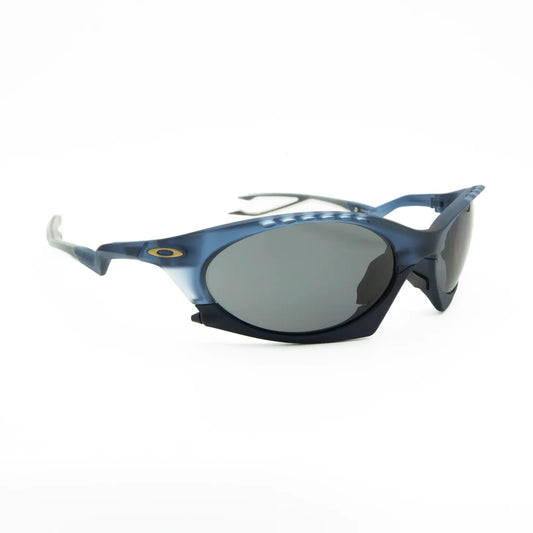 Occhiale da sole Oakley Plantaris OO9437 943709 Blu trasparente opaco