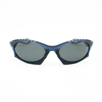 Occhiale da sole Oakley Plantaris OO9437 943709 Blu trasparente opaco